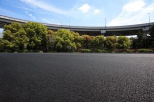freshly-paved blacktop in a parking lot