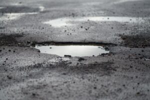 pothole filled with water